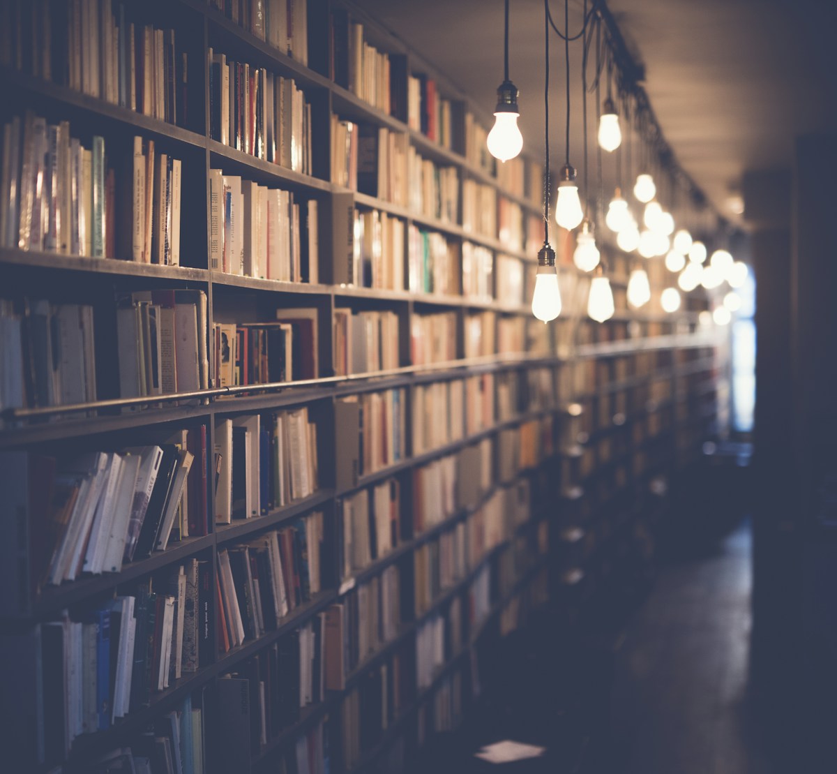 Books stacked in a library setting